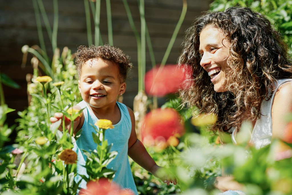 Celebration of life parent and child in garden