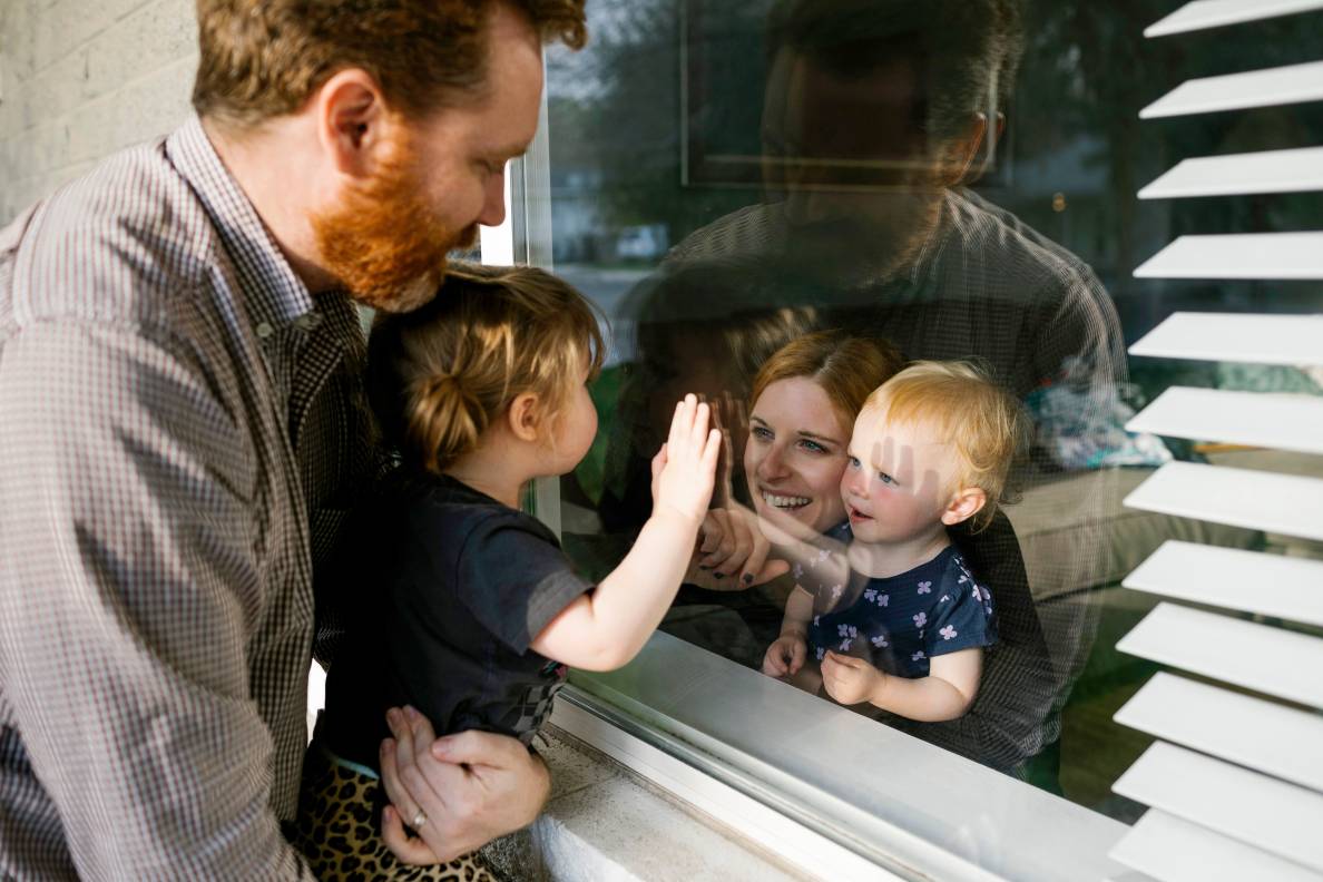 Celebration of life family through window