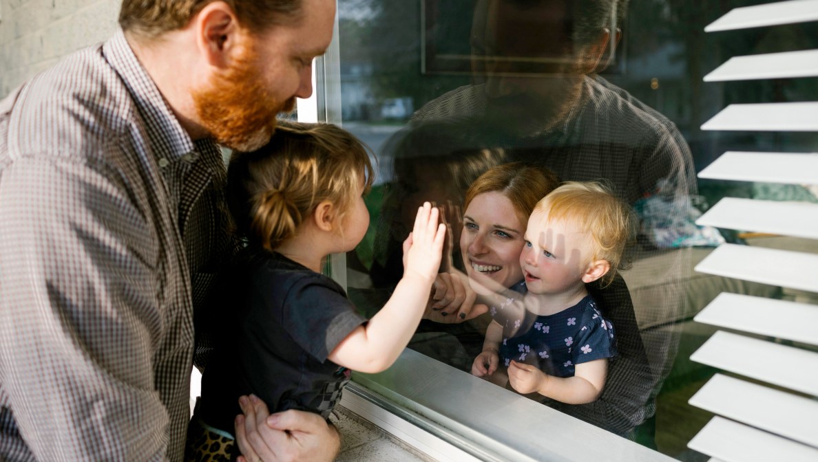 Celebration of life family through window