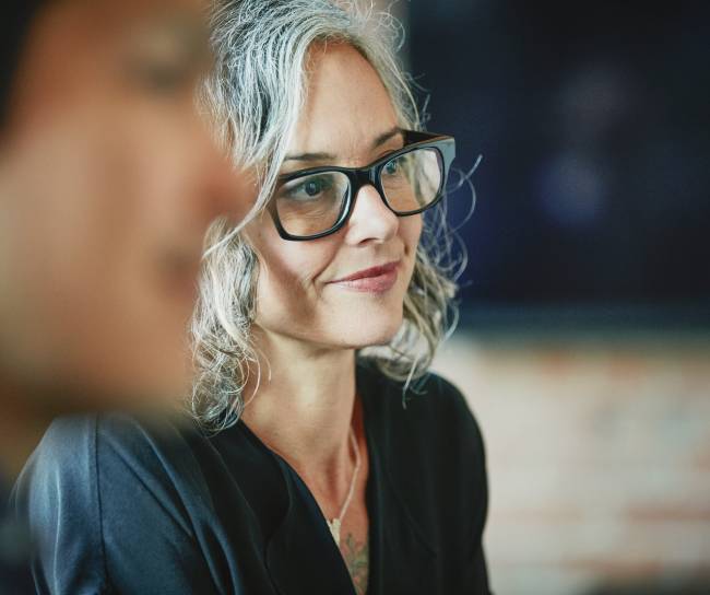 Our employees close up listening during team meeting